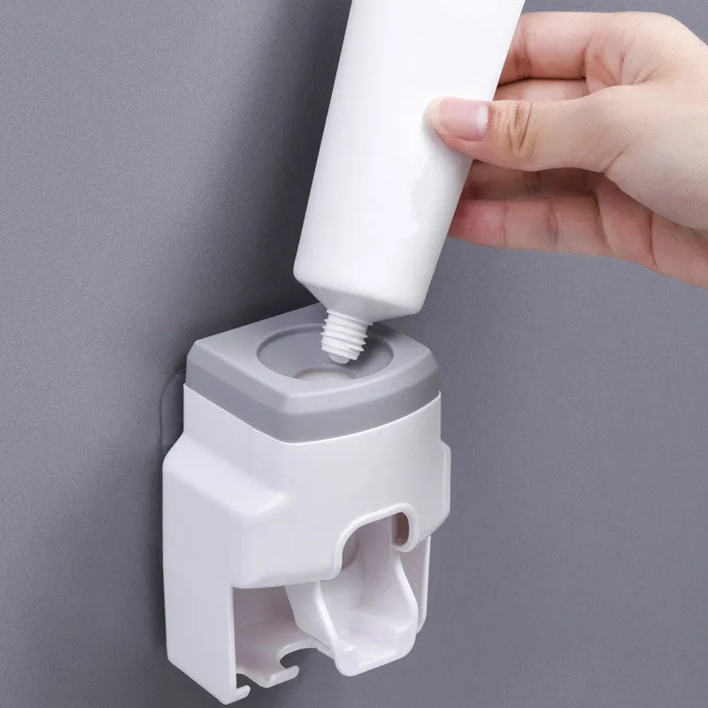 Automatic toothpaste squeezing toothbrush holder